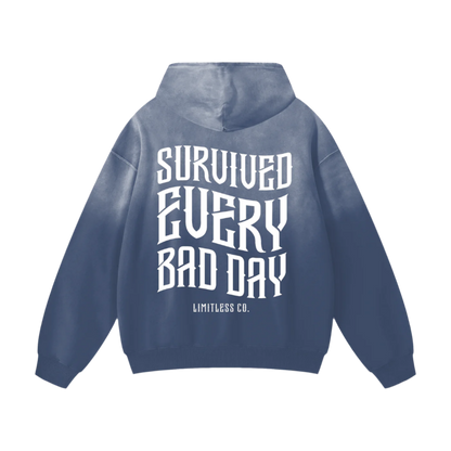 SURVIVED EVERY BAD DAY - HEAVYWEIGHT SUNFADE OVERSIZED HOODIE